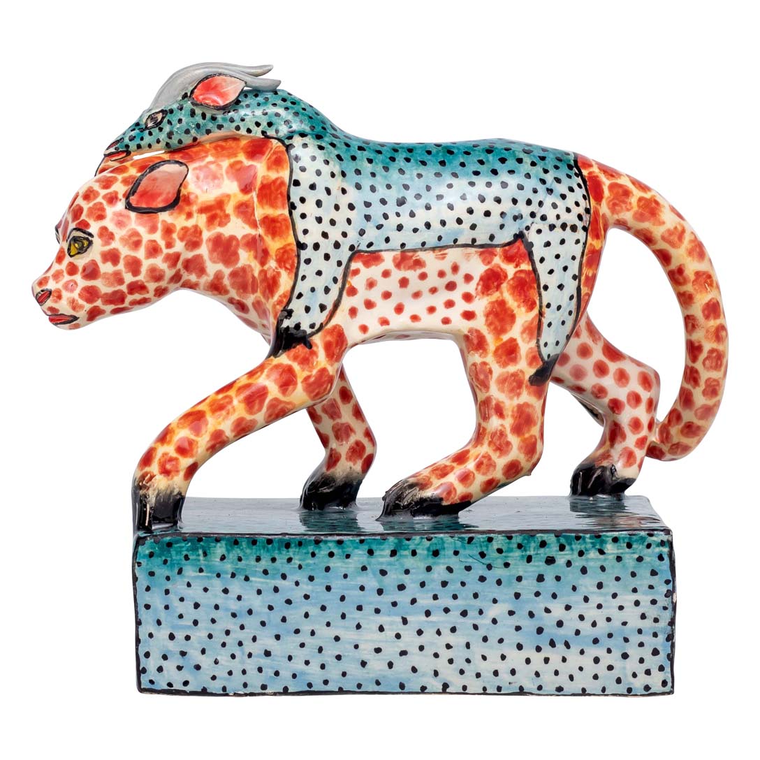 Leopard with giraffe skin standing sculpture