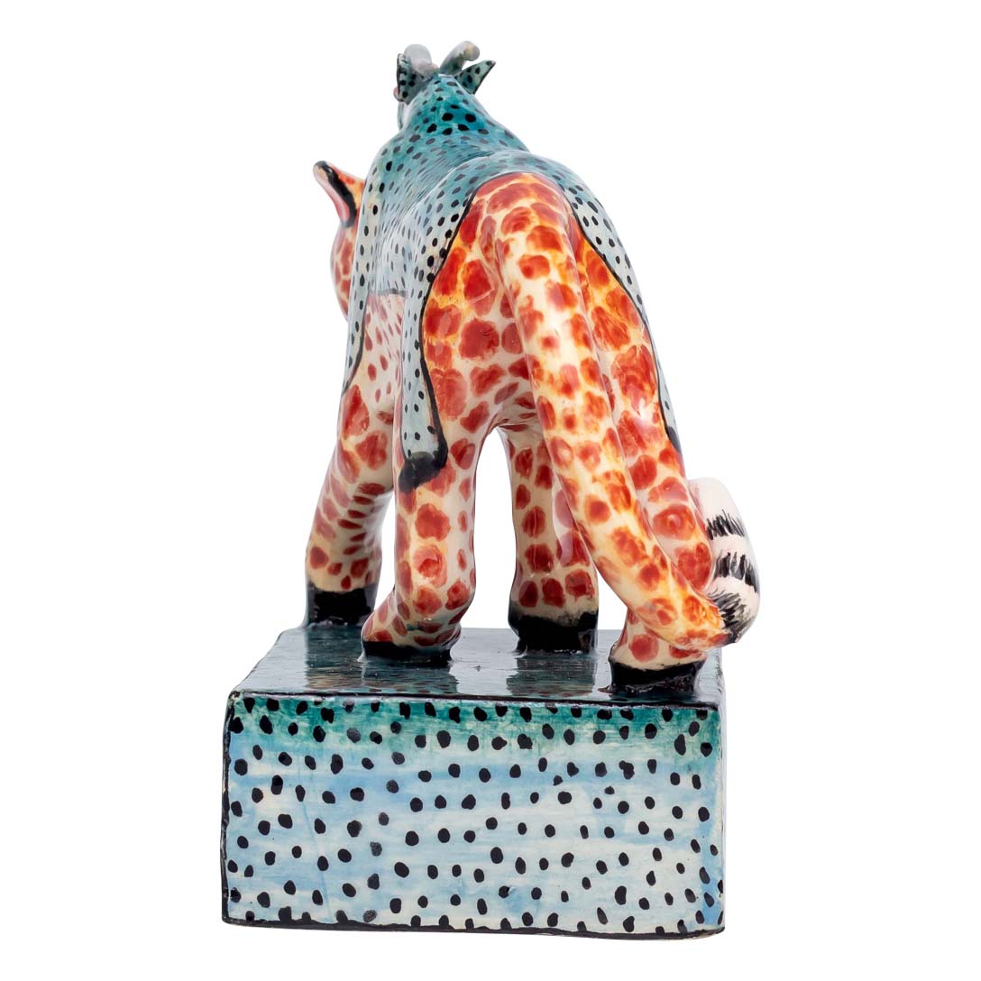 Leopard with giraffe skin standing sculpture