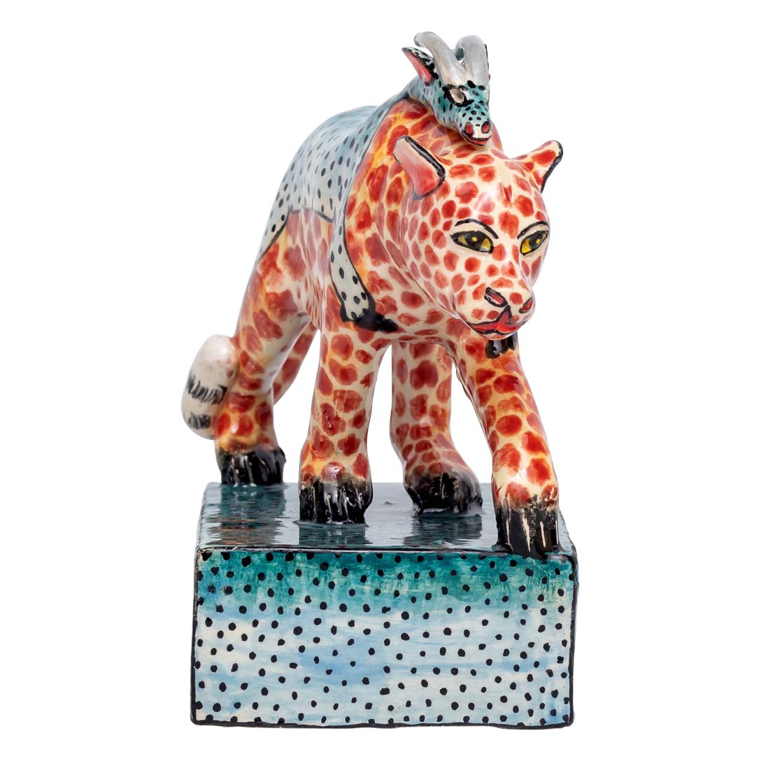 Leopard with giraffe skin standing sculpture