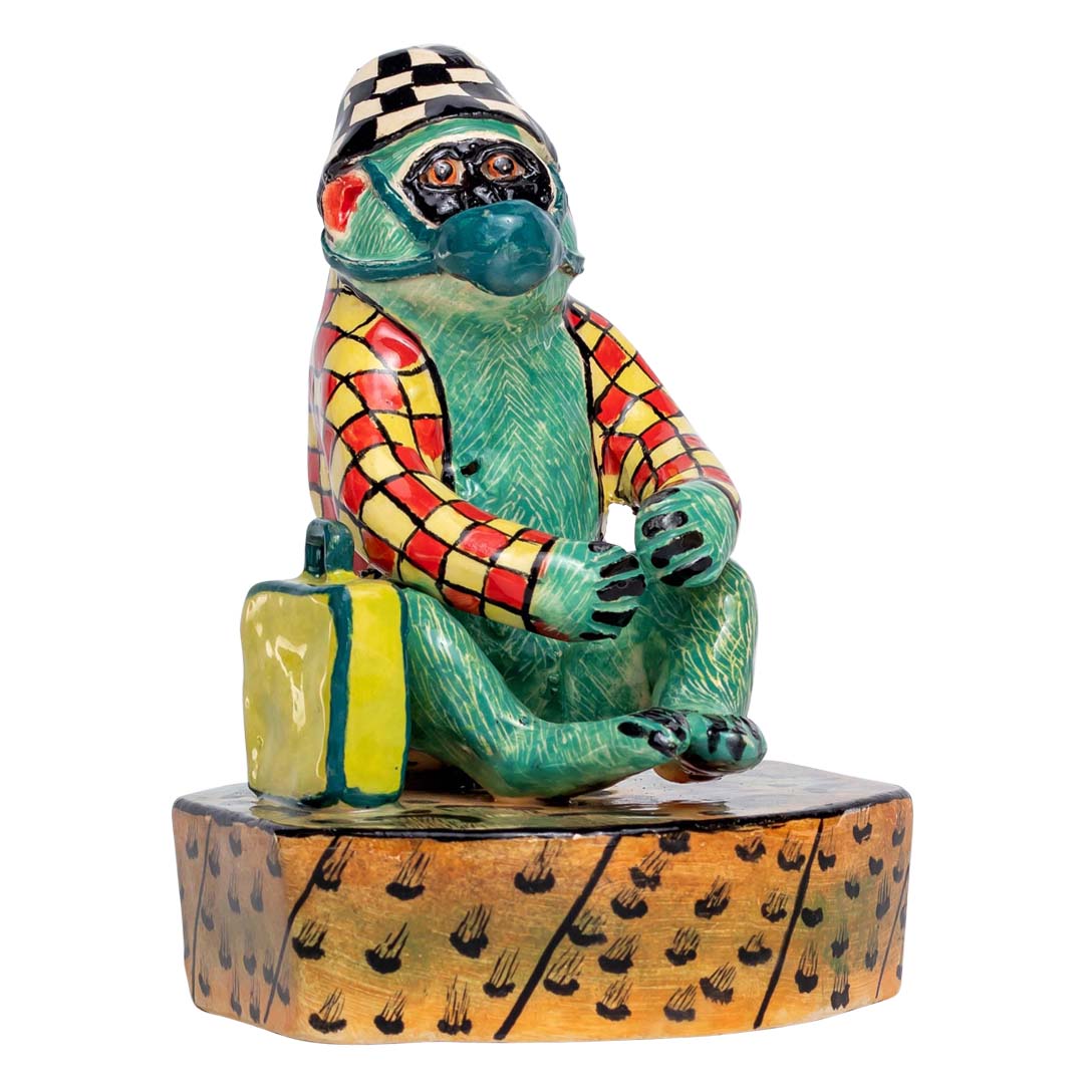 Sitting monkey/ masked sculpture