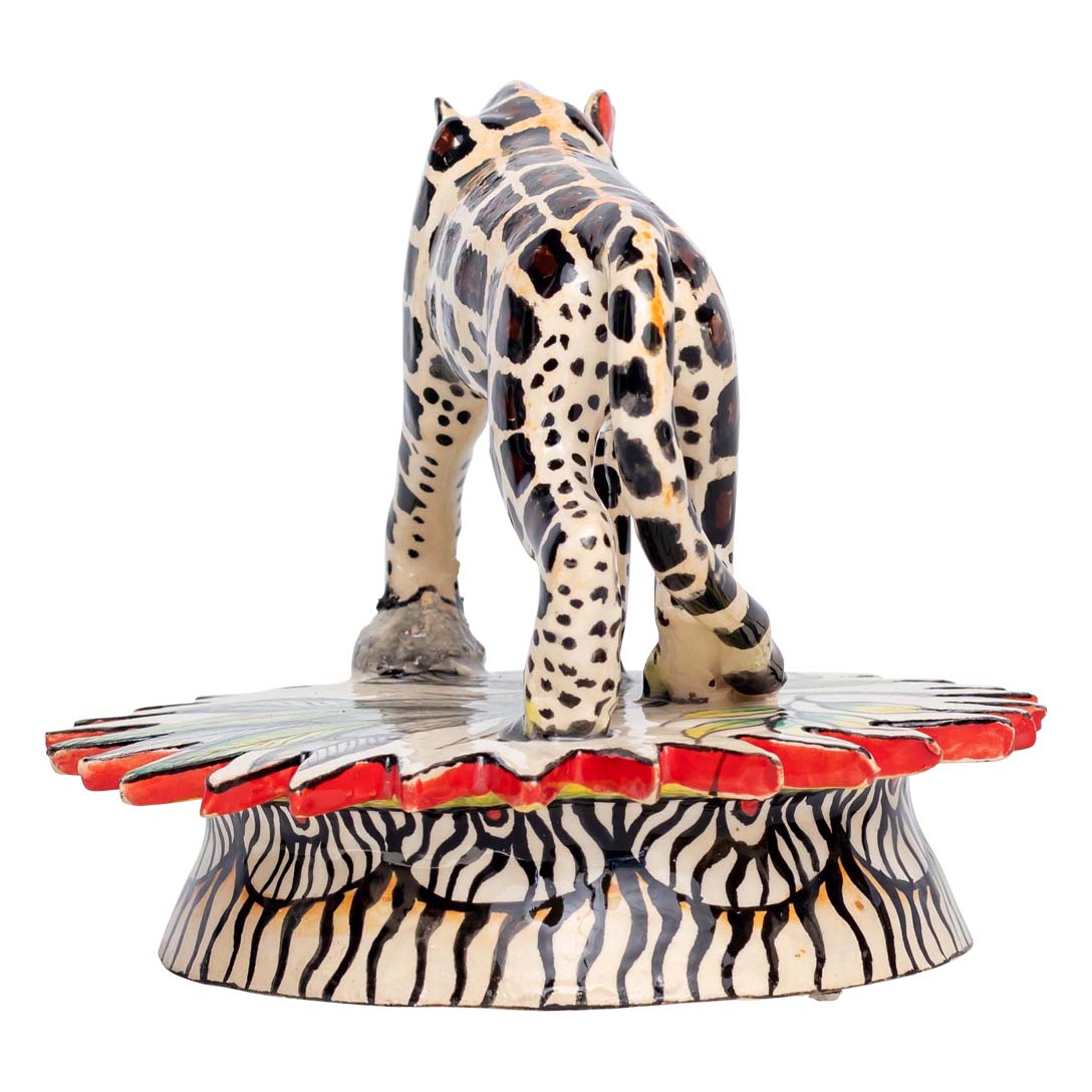 Skin designed leopard walking in his place sculpture