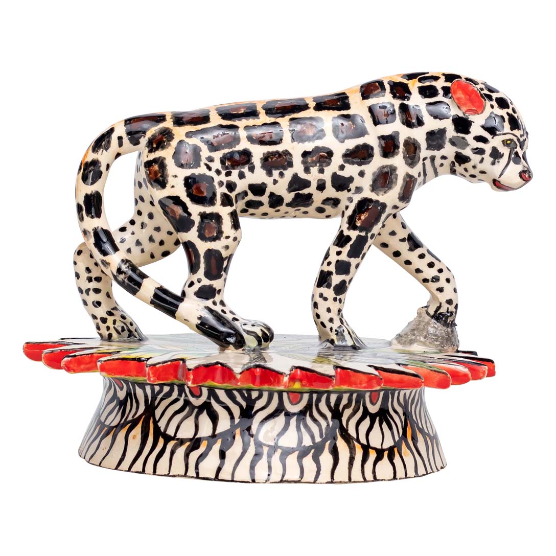 Skin designed leopard walking in his place sculpture