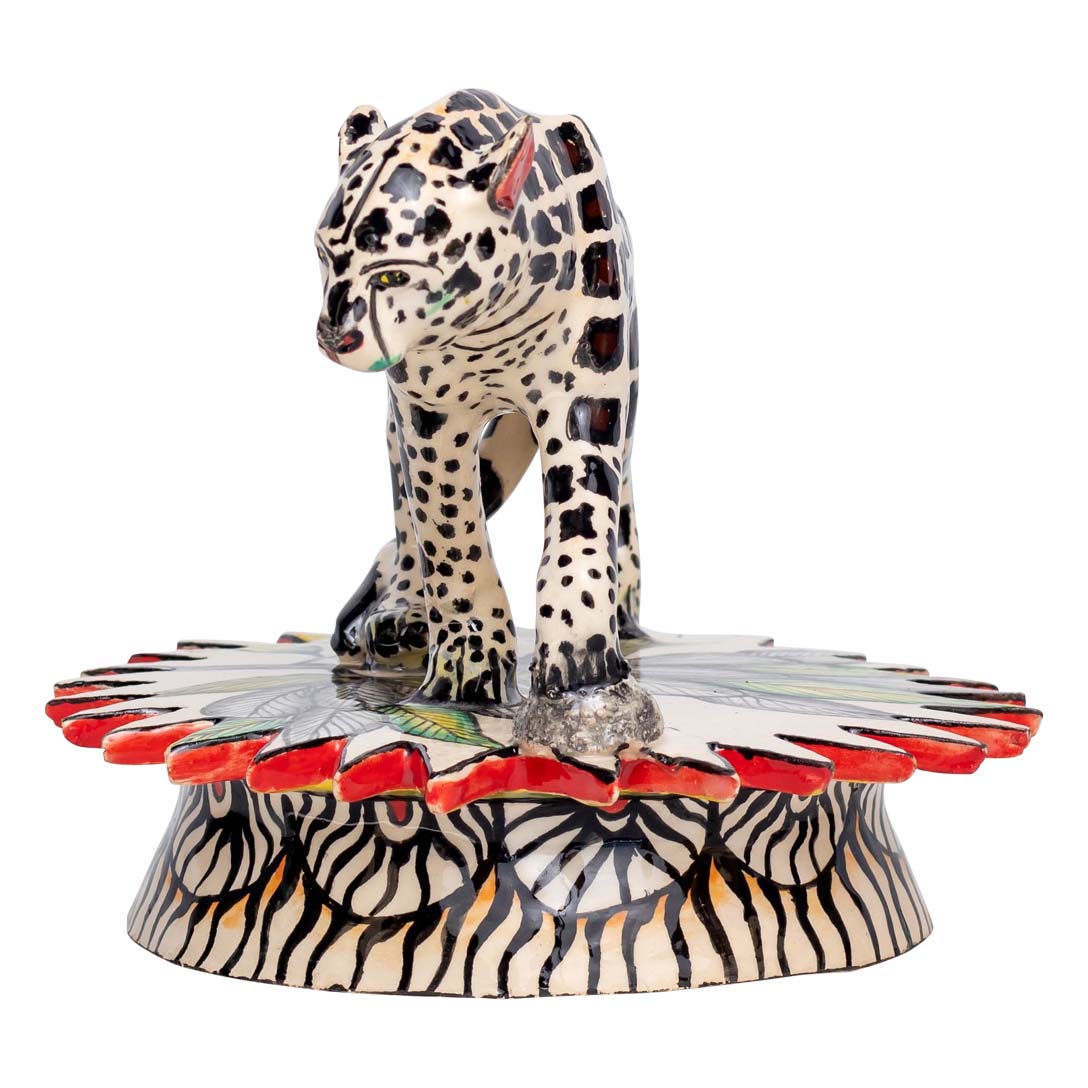 Skin designed leopard walking in his place sculpture