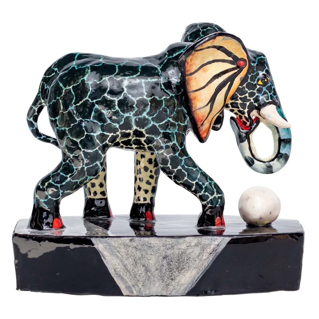 Skin designed elephant playing with the ball alone sculpture