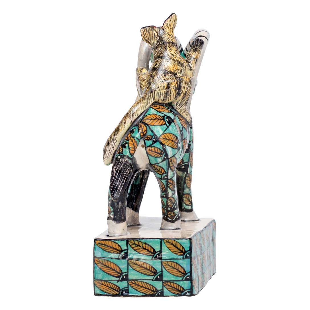 Bush baby riding a skin designed sable sculpture