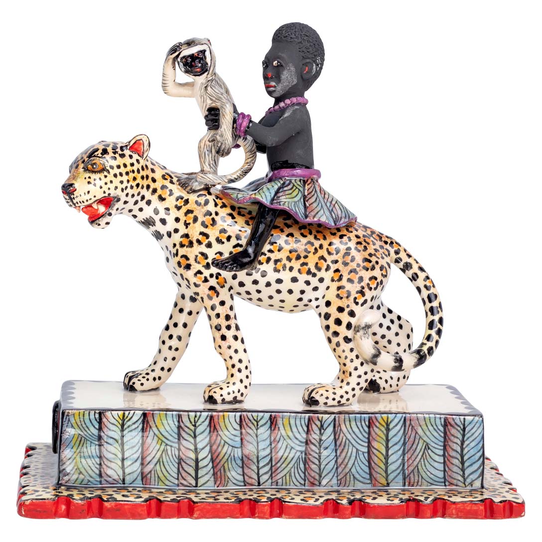 African women & monkey riding the leopard sculpture