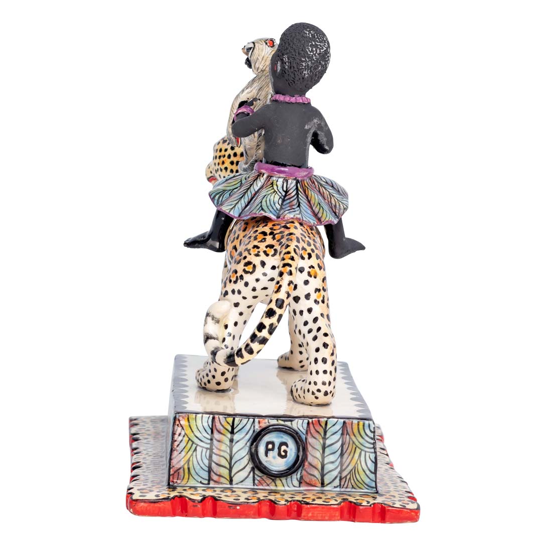 African women & monkey riding the leopard sculpture