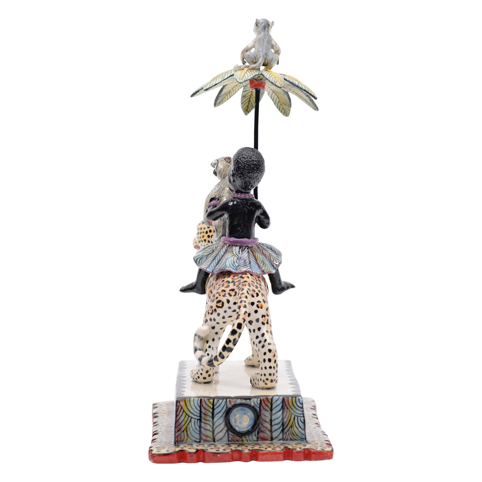 Woman & monkey on leopard rider sculpture