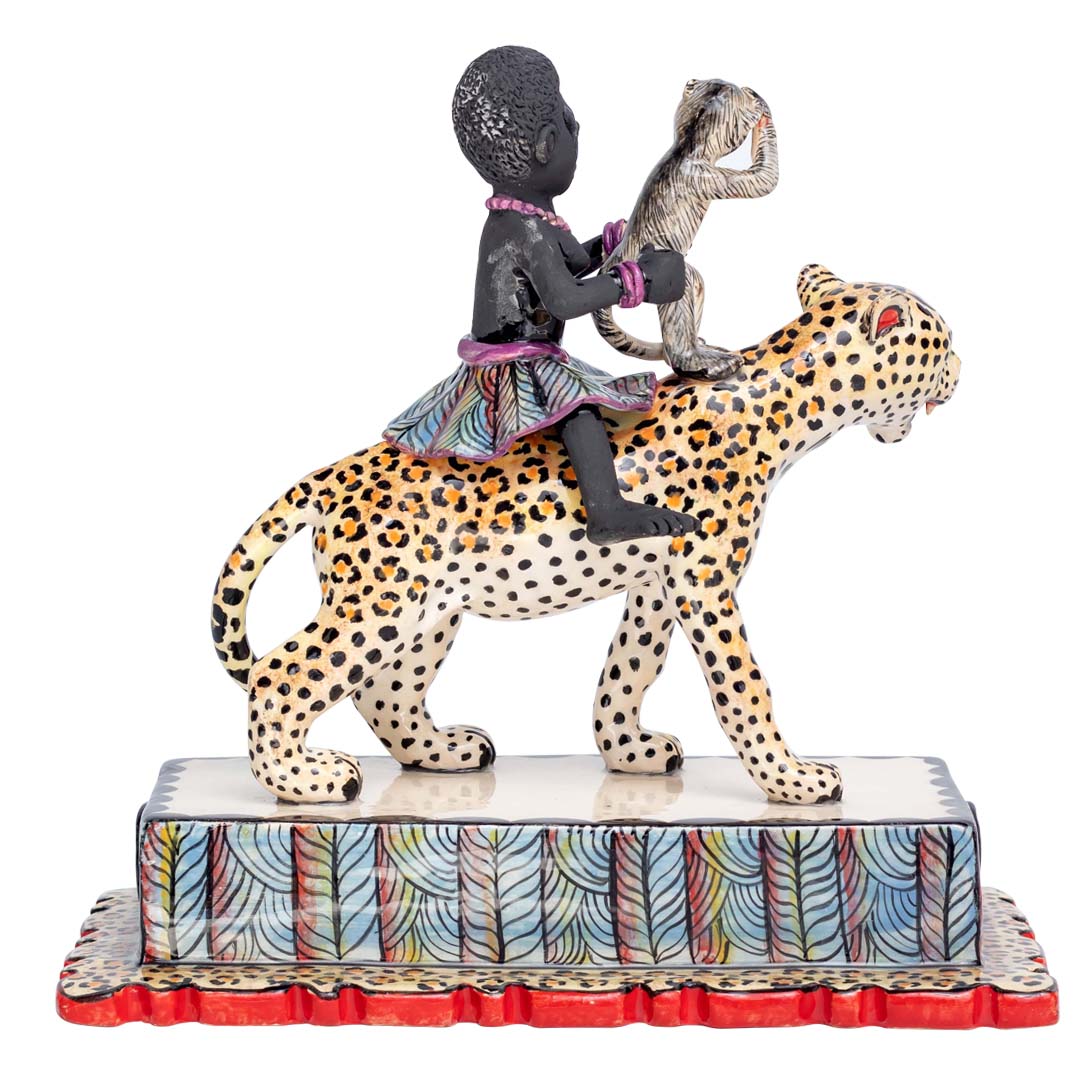 African women & monkey riding the leopard sculpture