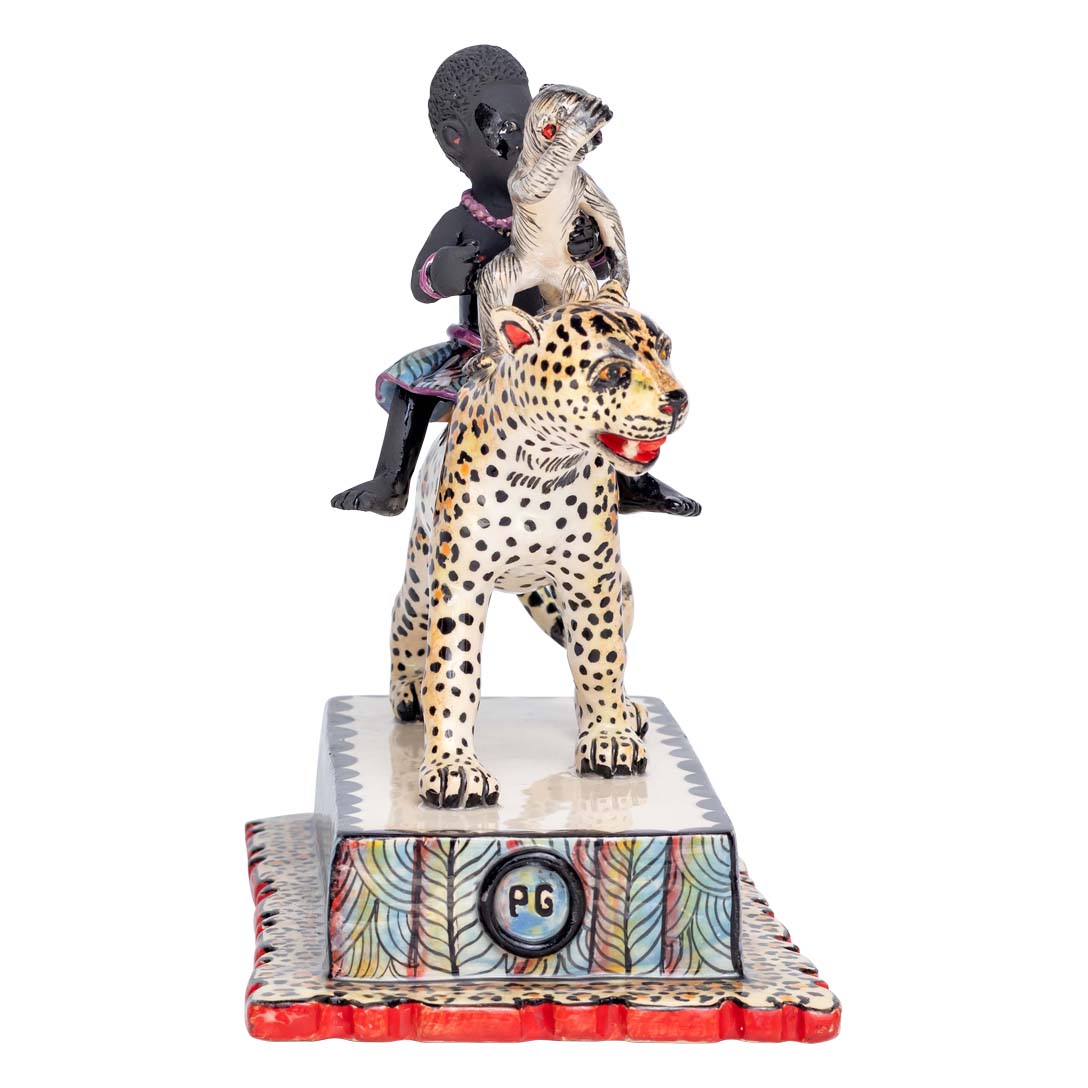 African women & monkey riding the leopard sculpture