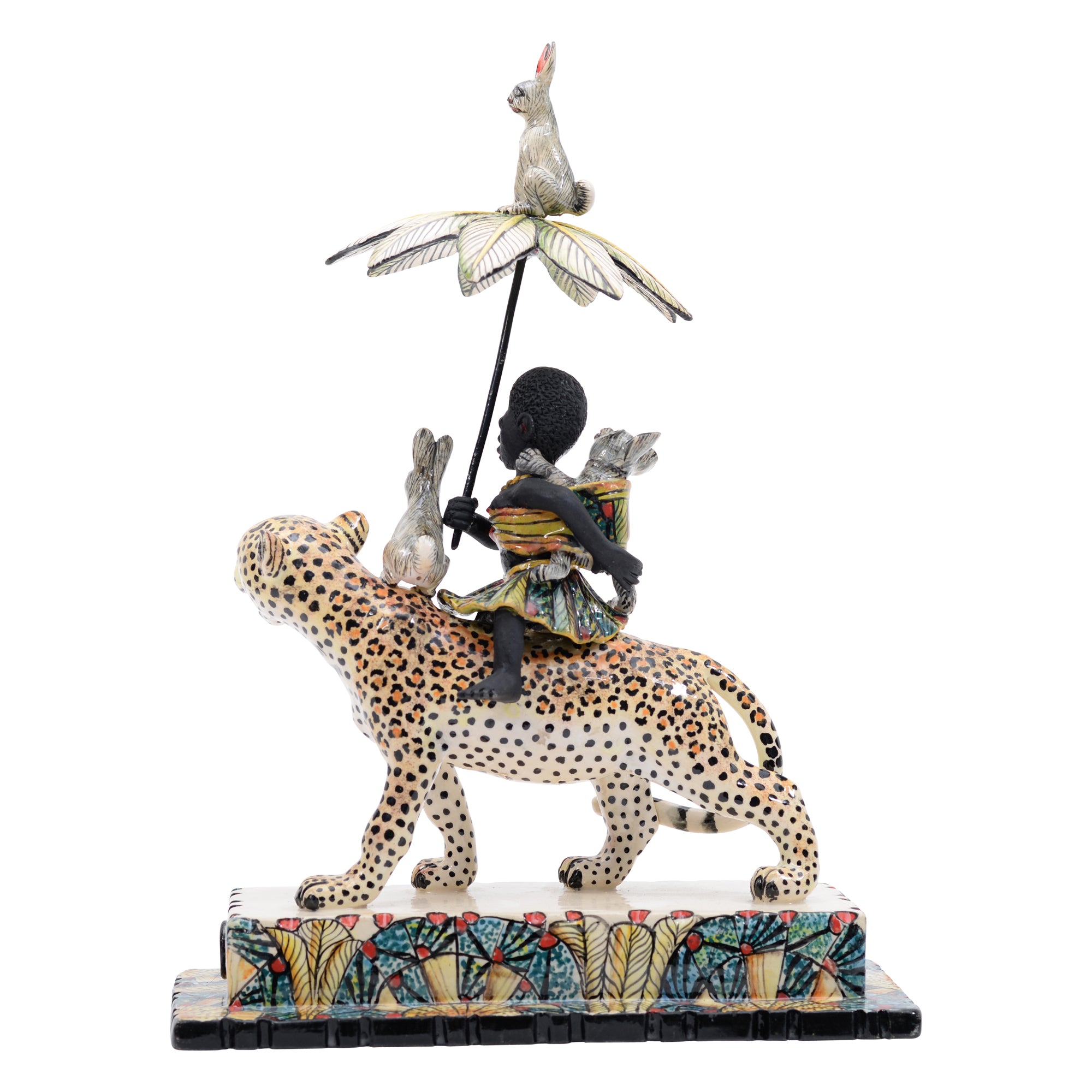 African woman & rabbits on leopard rider sculpture