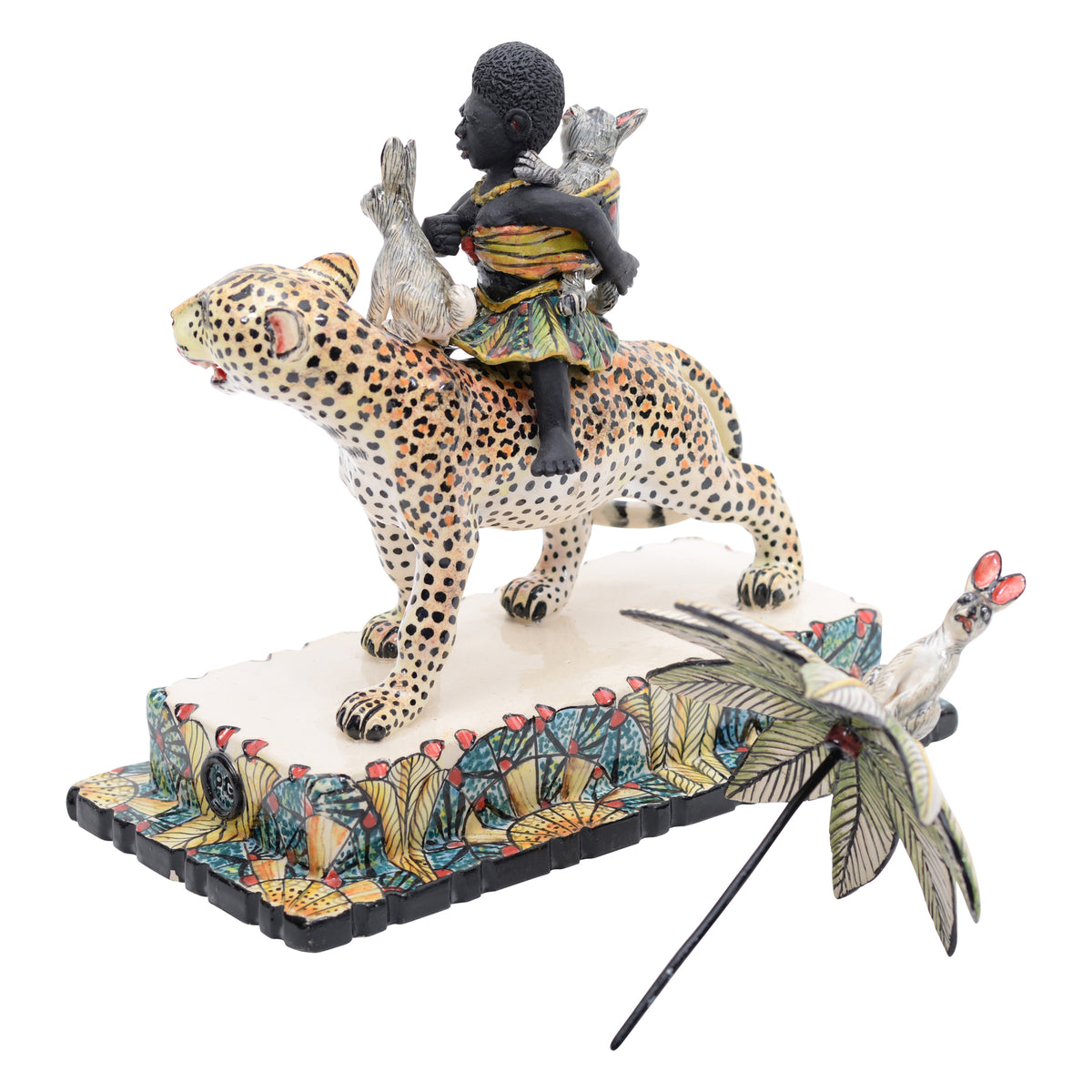 African woman & rabbits on leopard rider sculpture