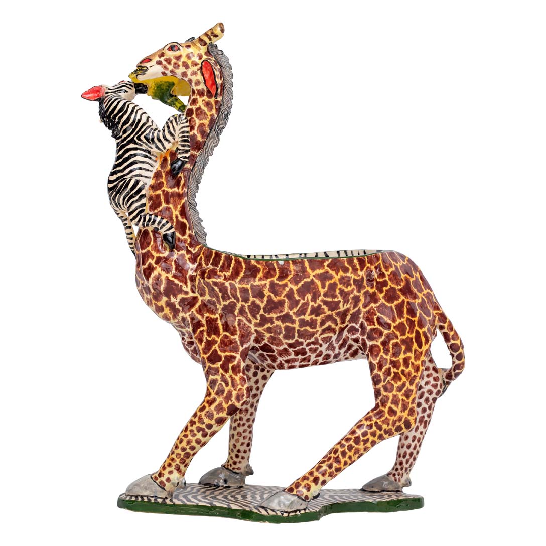 Zebra climbing a giraffe designed peanut bowl