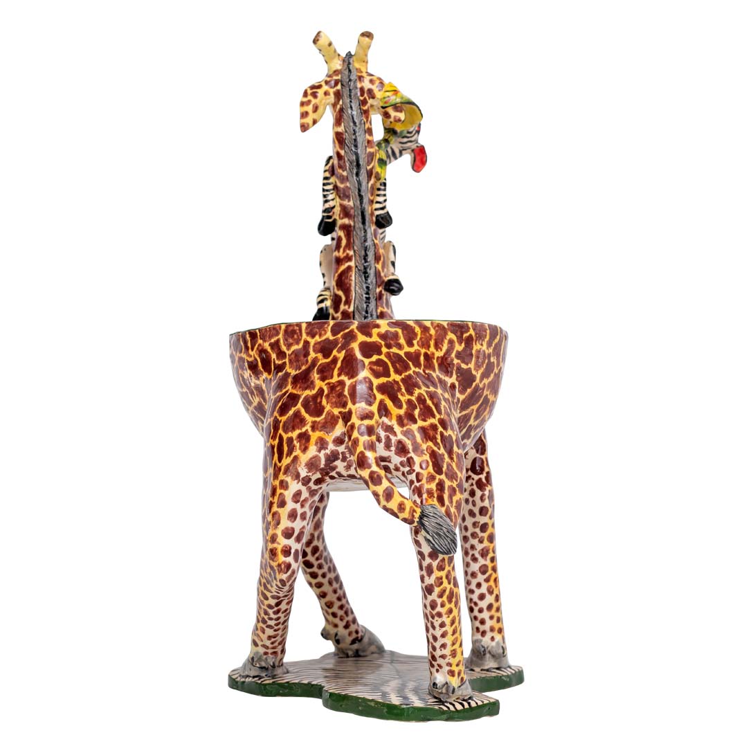 Zebra climbing a giraffe designed peanut bowl