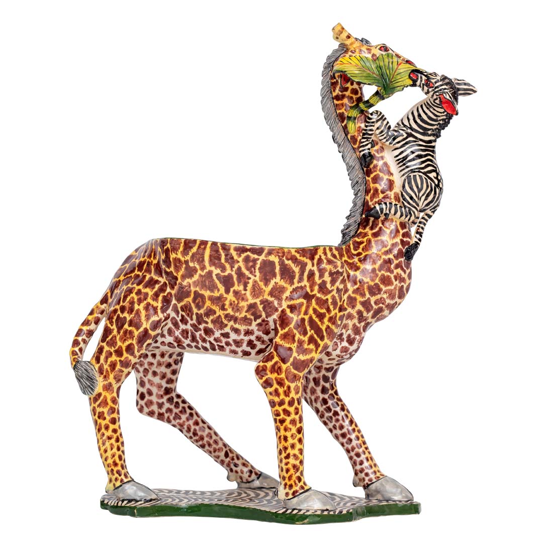 Zebra climbing a giraffe designed peanut bowl