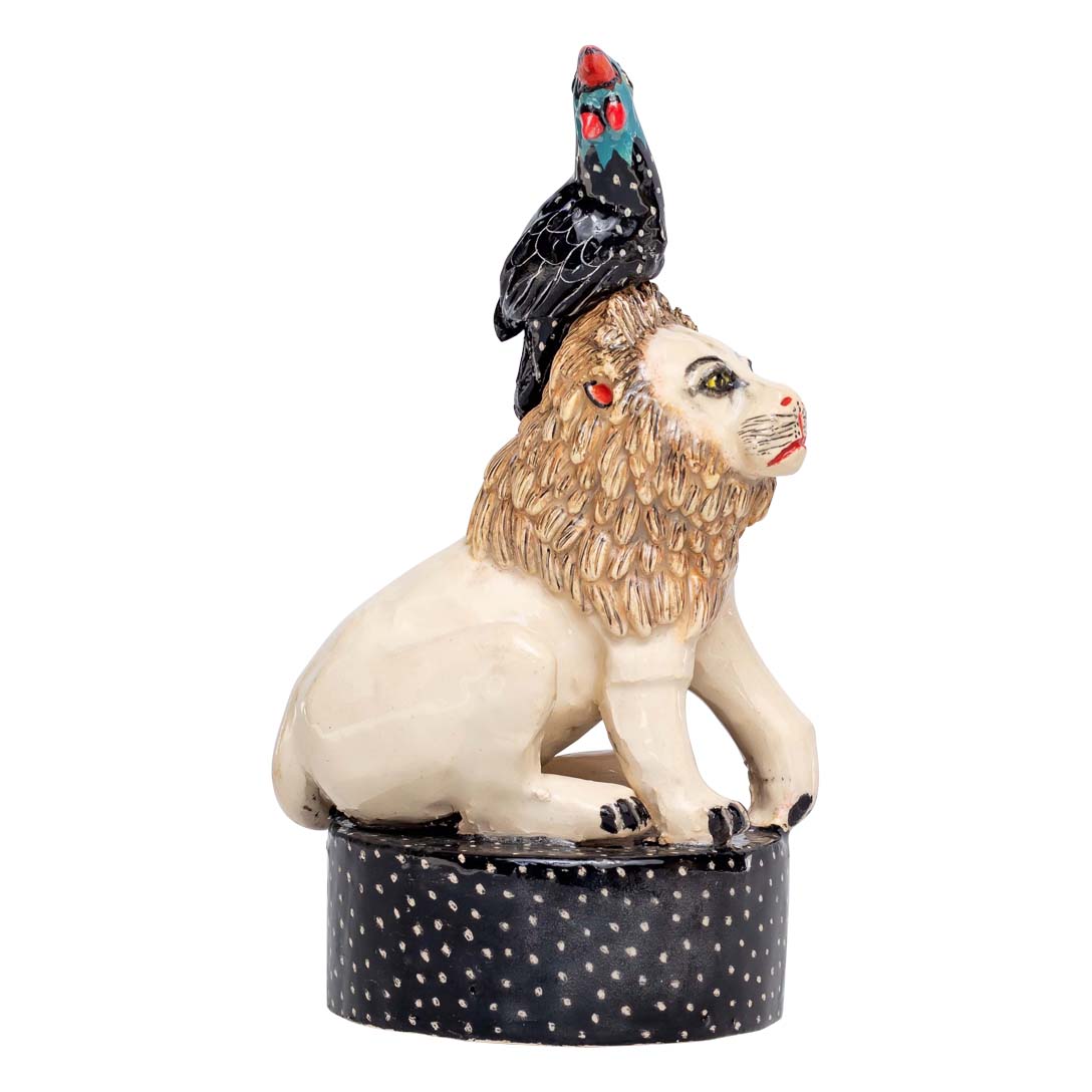 White lion & guineafowl sculpture