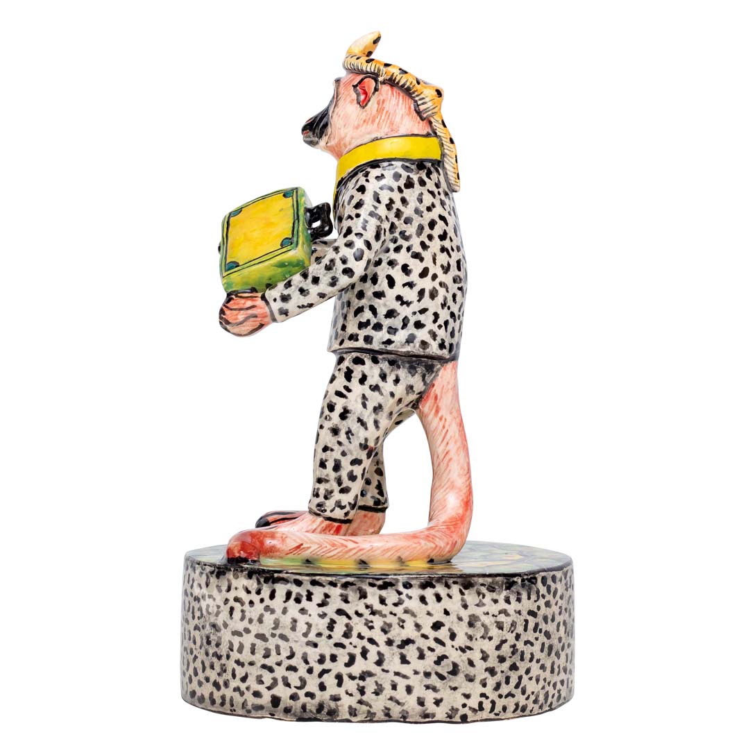 Monkey man wearing dalmatian designed clothes sculler