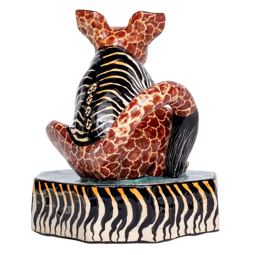 A zebra skin designed bush baby sculpture