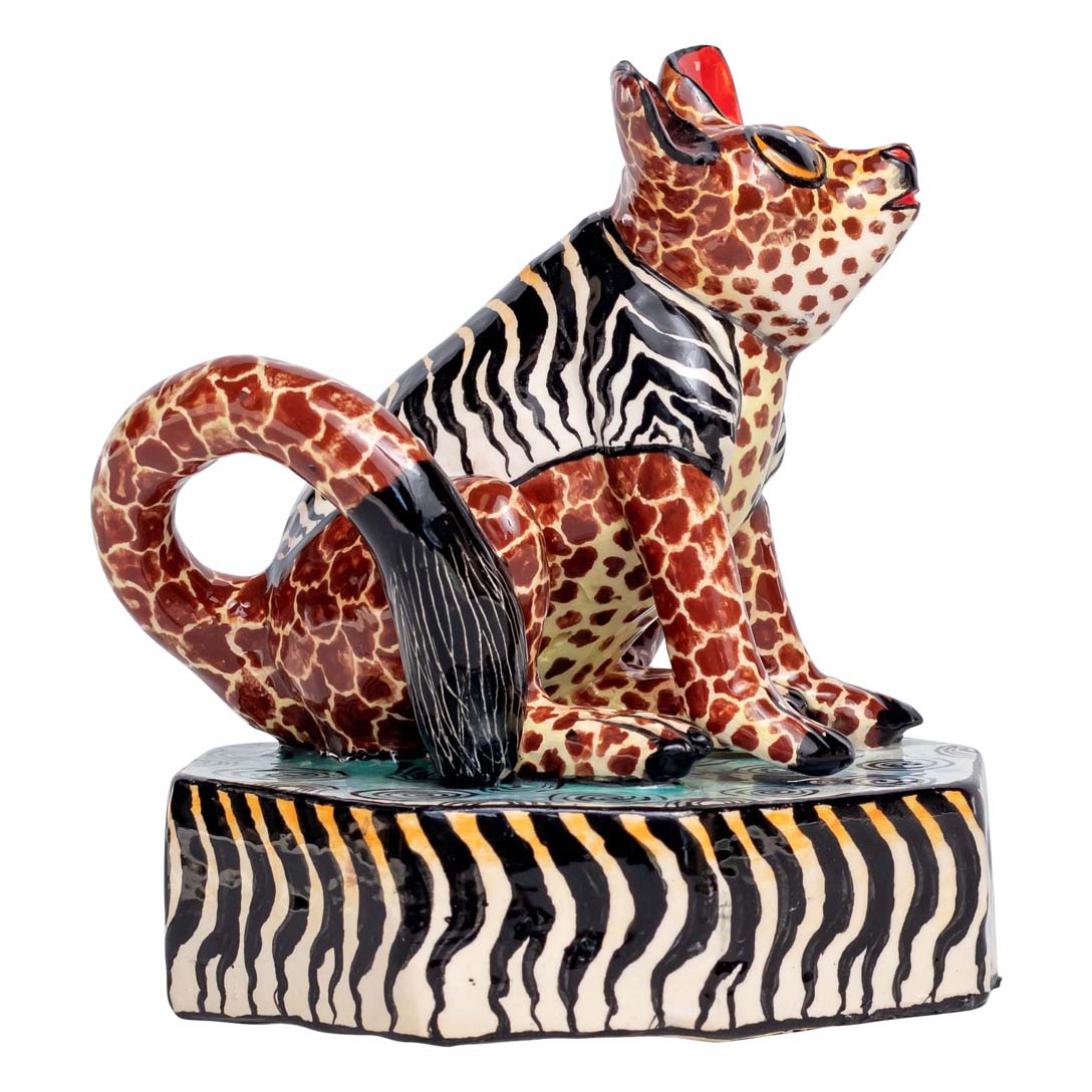 A zebra skin designed bush baby sculpture