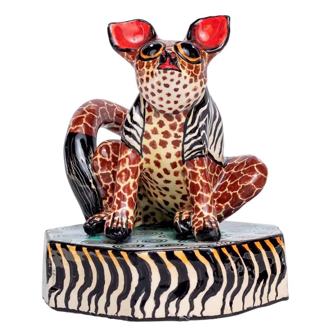 A zebra skin designed bush baby sculpture