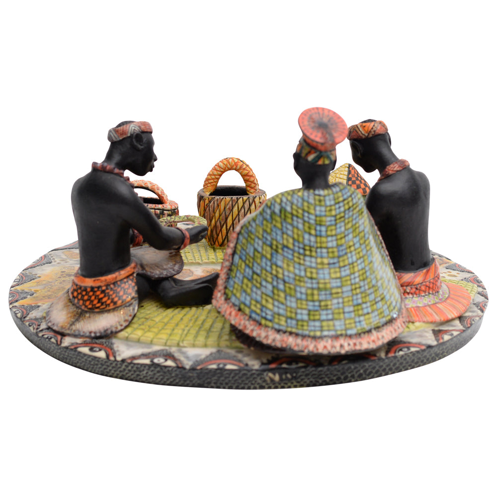 Women Making Basket Sculpture