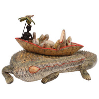 Crocodile boat rider sculpture